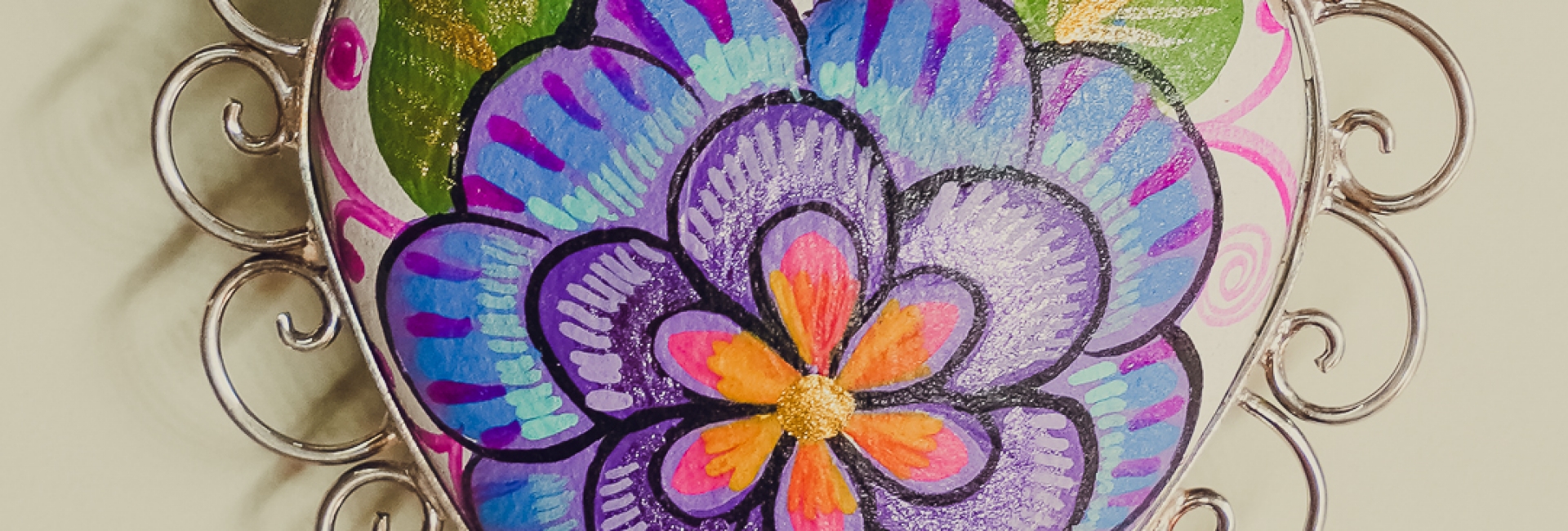 Colibrís, flores y amor para mamá con Oro de Monte Albán.